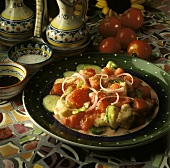 Panzanella (Bread salad with tomatoes, cucumber and onion rings)