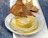 A Dish of Hummus with Olive Oil