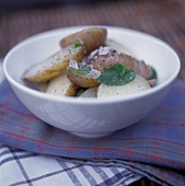 Sliced Potatoes with Parmesan and Herbs