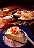 A Slice of Cheesecake with White Chocolate Flower
