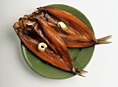 Two Kippers on a Green Plate
