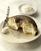 A Poppy Seed Bagel with Cream Cheese