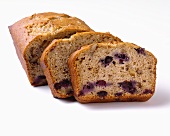 A Loaf of Blueberry Nut Bread with Slices