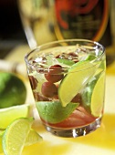 Cachaca Cocktail with Cherries and Limes