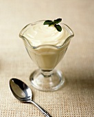 Vanilla Pudding in Glass Dish with Mint