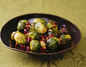 Brussel Sprouts with Cranberries on a Black Plate