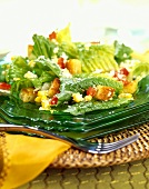 Romaine lettuce with sweetcorn, peppers, feta and croutons