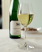A Glass and Bottle of Riesling; Nuts