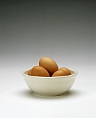 Bowl of Cage Free Hen Eggs; Stacked Bowls