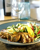 Barbecued tuna steak with salad