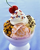 Mixed ice cream with cream and cherry