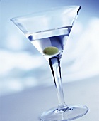 Martini with green olive