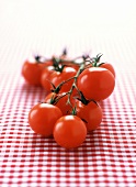 Cherry tomatoes on checked cloth