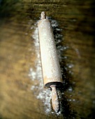 A Wooden Rolling Pin with Flour