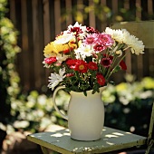 Asters and Mums in a White Pitcher