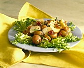 Potato salad with bacon and onions