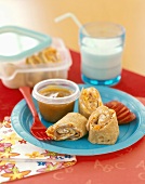 Ham and Cheese Roll Ups with Carrots and Dipping Sauce; Plastic Flatware