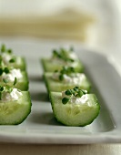 Cucumber snacks with sheep's cheese and cress