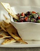 Bean salad with pita chips
