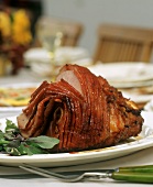Glazed roast ham, carved