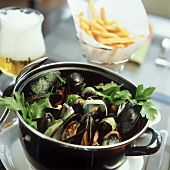 Steamed Mussels in a Pot with Parsley and Onions