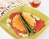 Beef Carpaccio Topped with a Parmesan Crisp and Grilled Asparagus