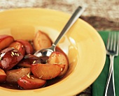 Bowl of Spiced Plums with Argodolce