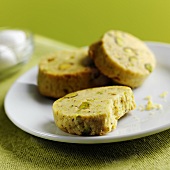 Pistachio biscuits on white plate