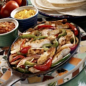Strips of chicken with peppers (filling for fajitas)
