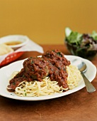 Linguine Topped with Meatballs and Tomato Sauce