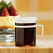 A Hot Cup of Coffee in a Glass Mug