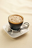 An Espresso in a Clear Cup with Sugar Cubes