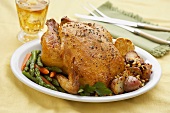 Roasted Chicken on a Platter with Asparagus, Carrots and Potatoes