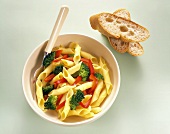 Pasta with Broccoli and Red Peppers and Two Slices of Bread