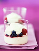 Vanilla Yogurt Layered with Blueberries and Raspberries in a Glass