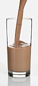 Pouring Chocolate Milk into a Glass
