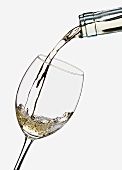White Wine Pouring into a Glass