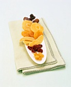 Assorted Dried Fruits on Green Linen