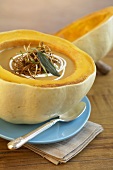 Pumpkin soup with fried onions in hollowed-out pumpkin