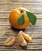 A Whole Tangerine with Segments