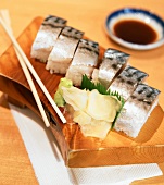 Nigiri Sushi on Board with Chopsticks