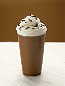 Tall Glass of Iced Hot Chocolate with Whipped Cream and Chocolate Shavings