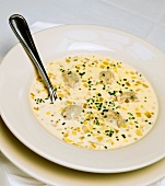 Single Serving of Seafood Chowder with Spoon