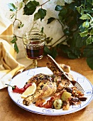 Roasted Chicken with Ratatouille on a Plate with a Glass of Wine