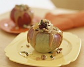 Apple with nut stuffing and caramel sauce
