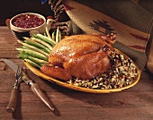 Platter with Roasted Chicken with Wild Rice and String and Wax Beans; Bowl of Cranberry Sauce