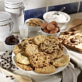 Assorted Homemade Cookies on a Platter with Baking Ingredients