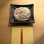 Asian Rice with Sun Dried Tomatoes on a Square Plate