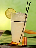 Rita Drink with Lime Slice and Two Plastic Stirrers