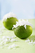 Two Key Limes filled with Coconut Shavings